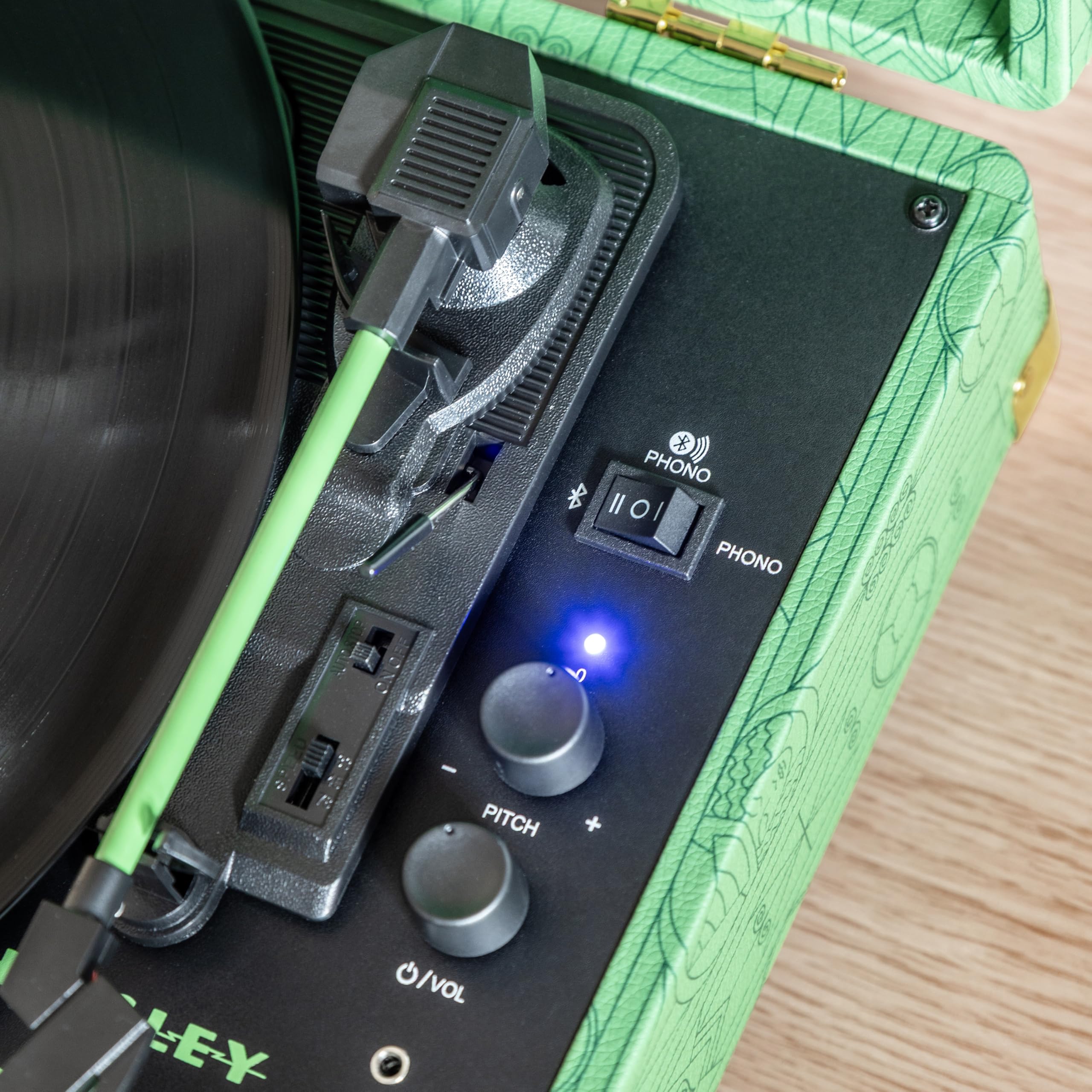 Crosley x Wicked: for Good Cruiser Plus Vintage 3-Speed Bluetooth in/Out Suitcase Vinyl Record Player Turntable with Built-in Speakers, Elphaba Edition